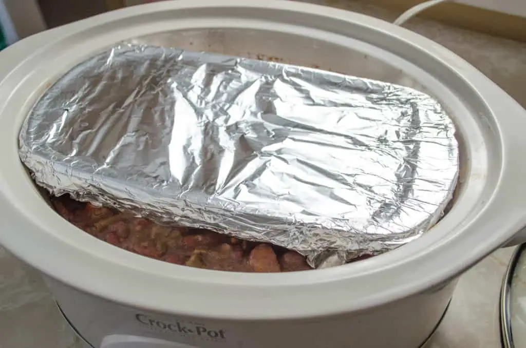 Bread Pan With Rice Inside The Slow Cooker for Crockpot Red Beans and Rice