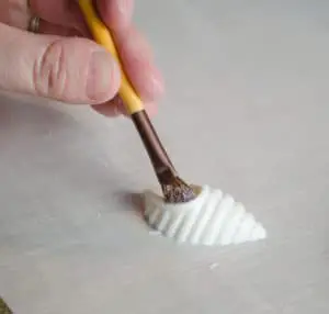 Brushing On Luster Dust for DIY Chocolate sparkle candies 