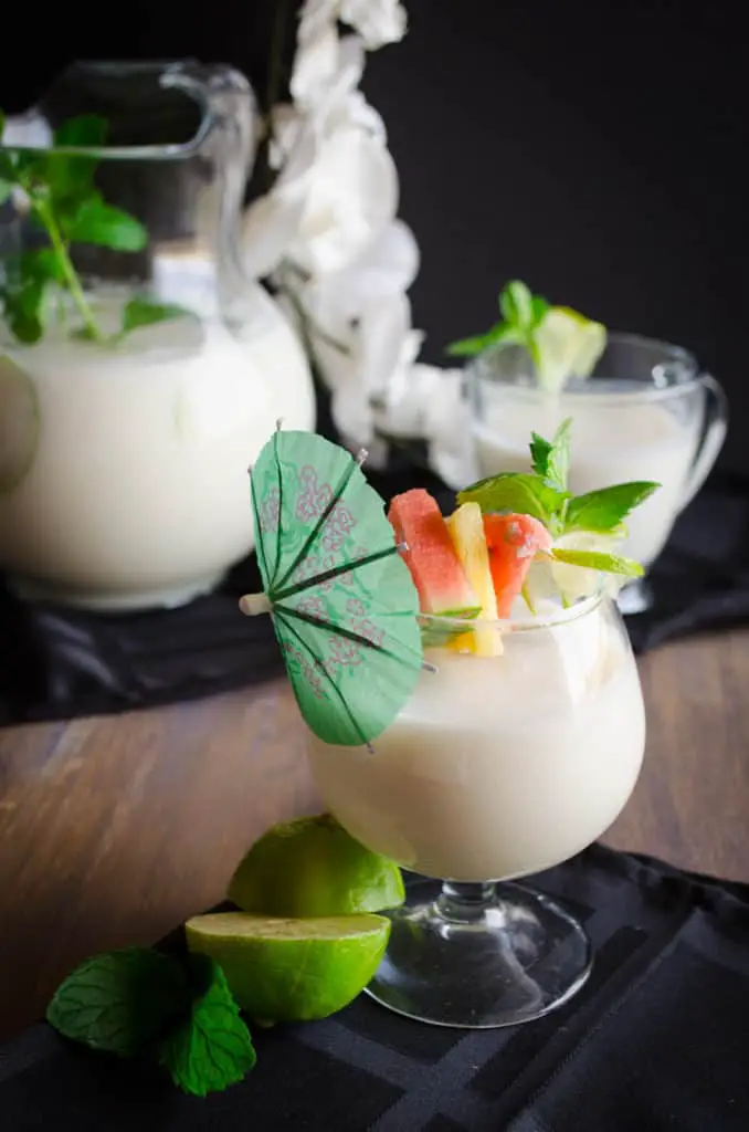 Glasses filled with Crowd Pleasing Coconut Lime Mocktail.