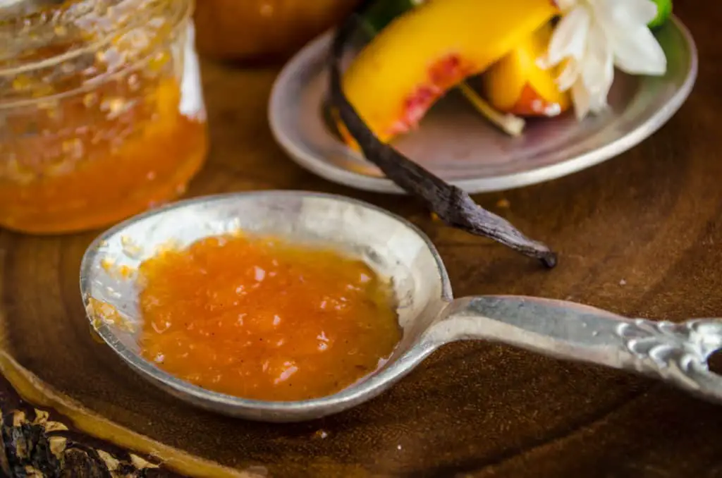 You can see the vanilla beans in this close-up of Homemade Vanilla Bean Peach Jam.