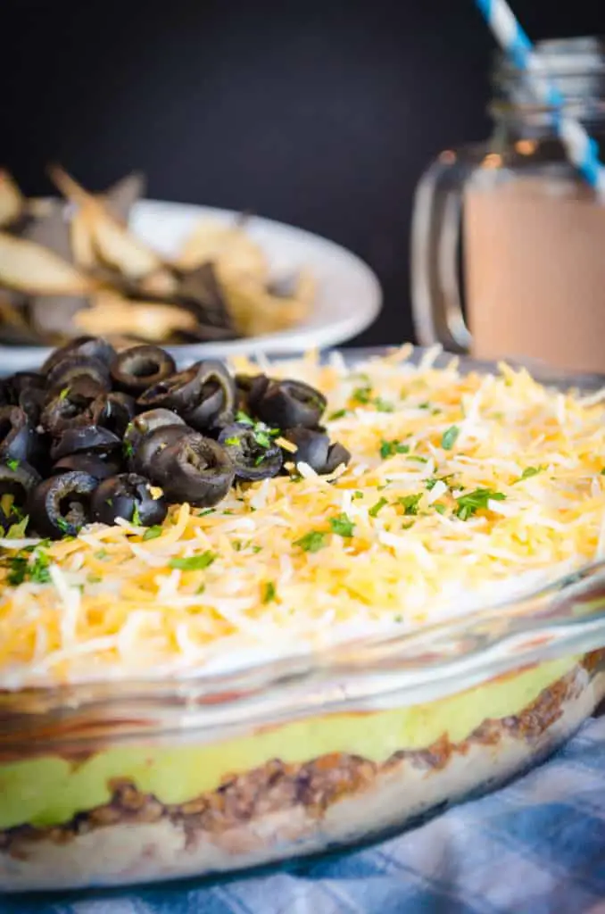 A side view close-up of Spicy Chipotle Seven Layer Dip showing all the layers.