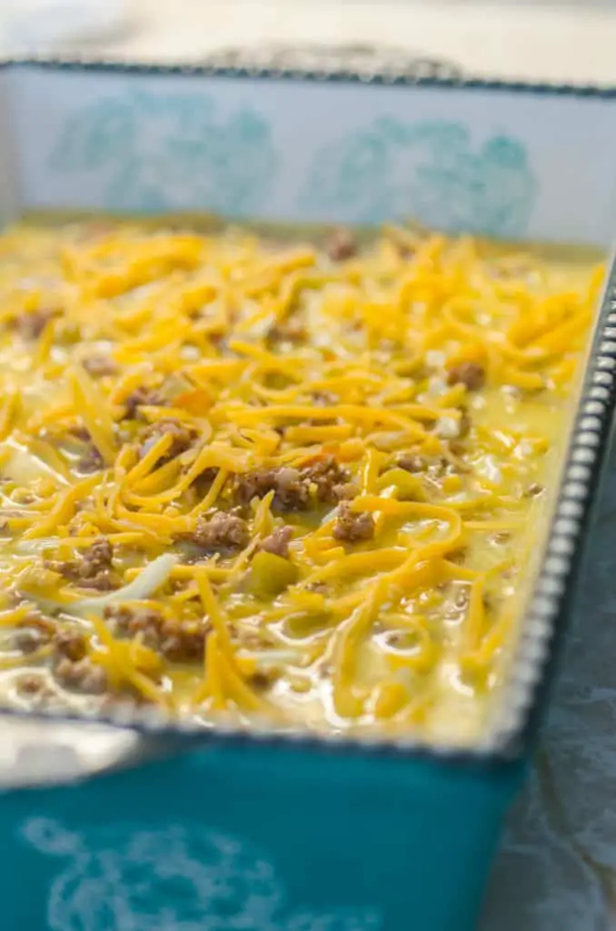 All the ingredients for Green Chile Breakfast Cubes are combined and poured into a casserole dish to bake in the oven.