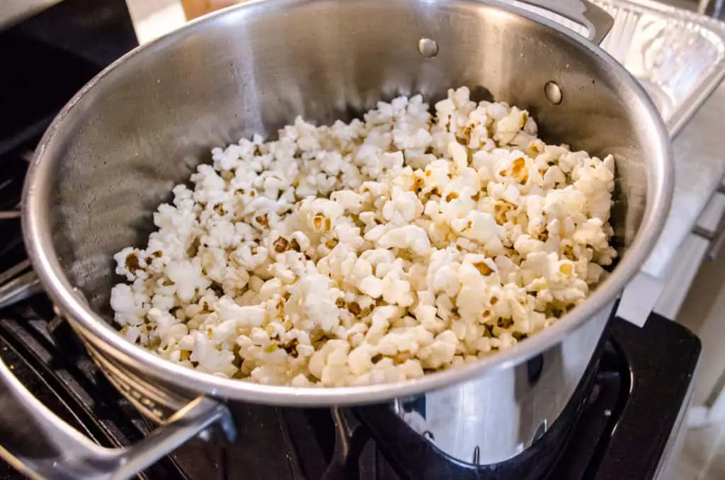 A stockpot full of popped popcorn for Microwave Caramel Popcorn - The Goldilocks Kitchen