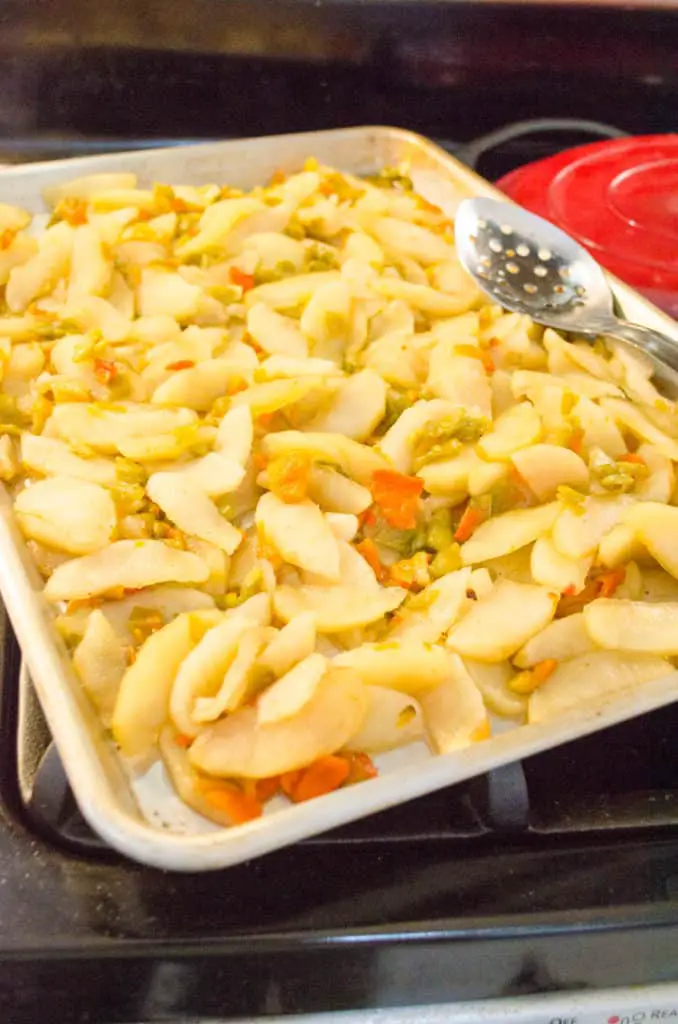 Green Chile pie filling sits on a rimmed baking sheet to cool - The Goldilocks Kitchen