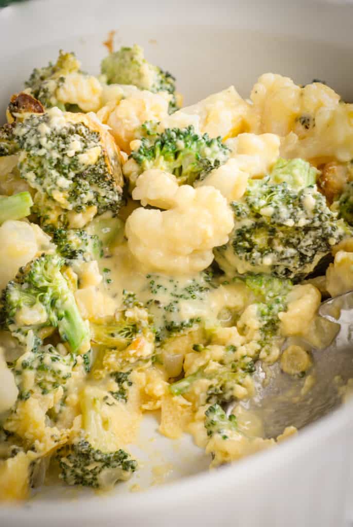 A closeup picture of Cheesy Cauliflower Broccoli Bake - The Goldilocks Kitchen