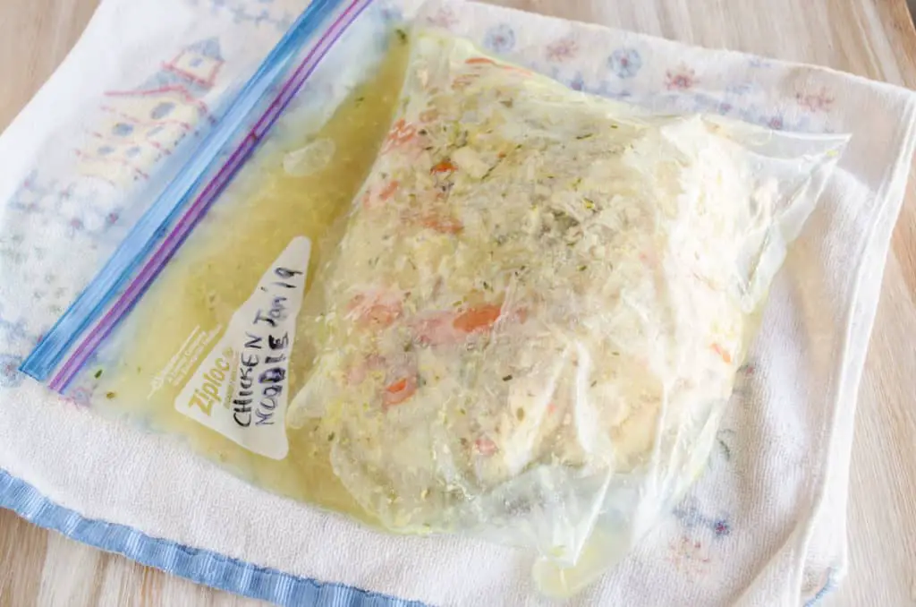 Make Ahead Chicken Noodle Soup frozen in a freezer bag - The Goldilocks Kitchen