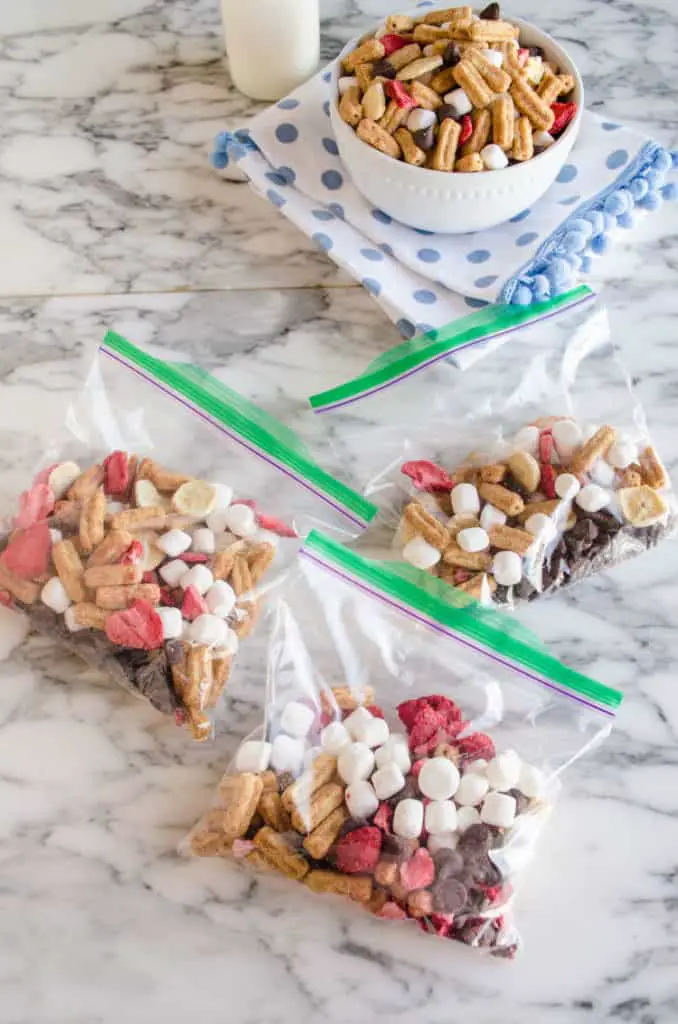  Churros Snack Mix in baggies on a counter - The Goldilocks Kitchen