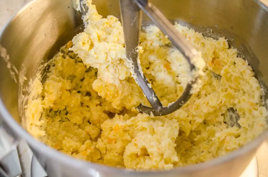The filling mixture for Make Ahead Twice Baked Potatoes mixes in a stand mixer - The Goldilocks Kitchen