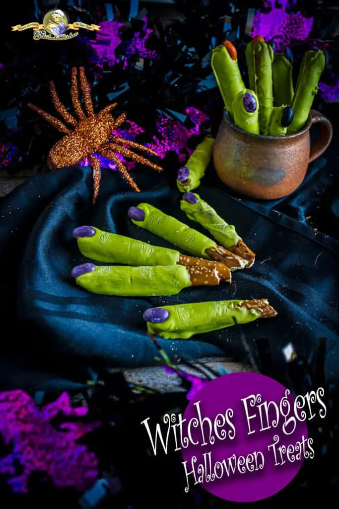 Looking for Halloween treat ideas and crafts? Witch Fingers Halloween Treats recipe @ The Goldilocks Kitchen are the yummiest, spookiest Halloween Treats on the web! Made simply from pretzel rods, green Wilton Candy Melts, and jelly beans for finger nails. Go check it out now. #HalloweenTreats #HalloweenCandy #HalloweenCrafts
