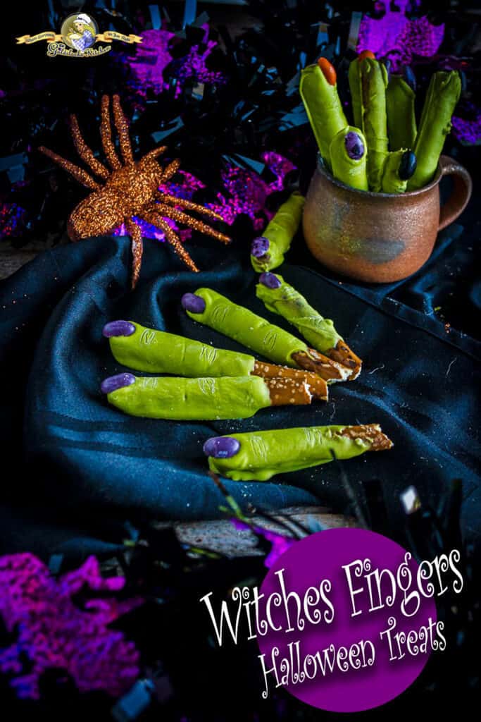 Looking for Halloween treat ideas and crafts? Witch Fingers Halloween Treats recipe @ The Goldilocks Kitchen are the yummiest, spookiest Halloween Treats on the web! Made simply from pretzel rods, green Wilton Candy Melts, and jelly beans for finger nails. Go check it out now. #HalloweenTreats #HalloweenCandy #HalloweenCrafts
