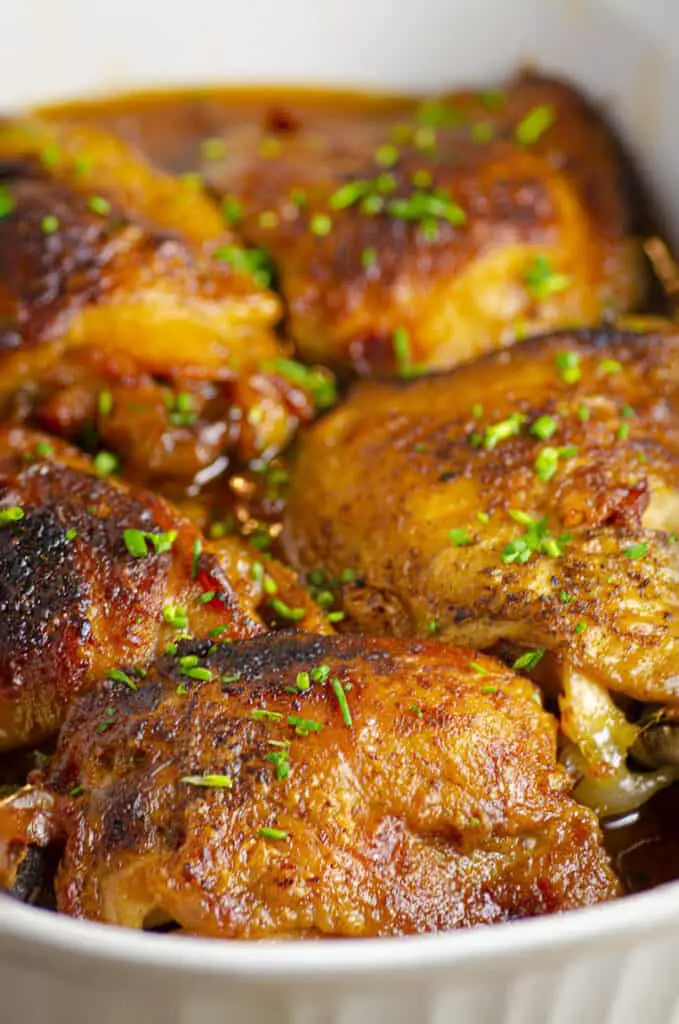 A close-up picture of deep golden brown Slow-Cooker Brown Sugar Apple Chicken ready to be served.
