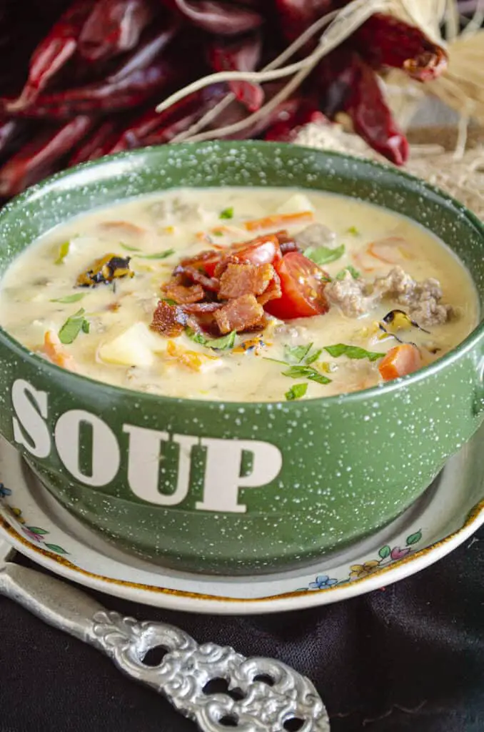 This Hatch Green Chile Cheeseburger soup can also be made in a crockpot. Brown beef and bacon separately, then place all ingredients except cheese, beef, and bacon into the crockpot