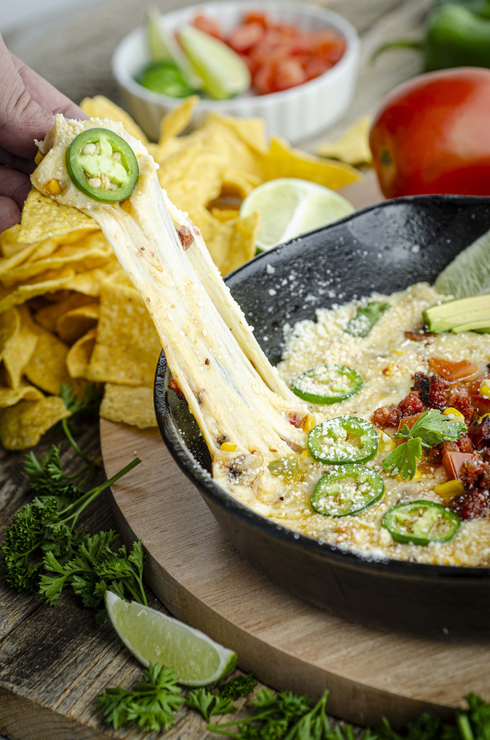 The Best Queso Fundido Dip cooked in Cast Iron